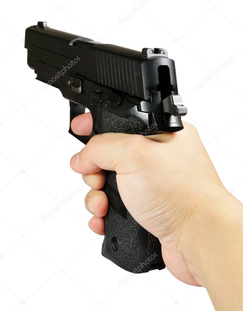 Pistol in hand Stock Photo by ©tshooter 2369179