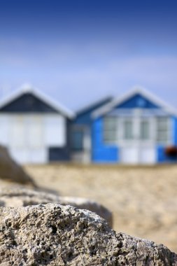 Beach Huts and Rock clipart