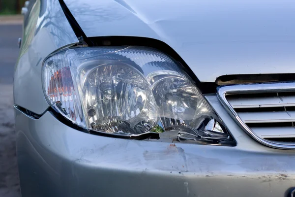 stock image Broken headlight of the car