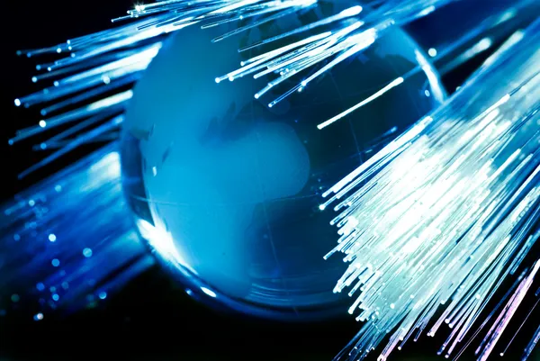 Earth and fiber optics — Stock Photo, Image