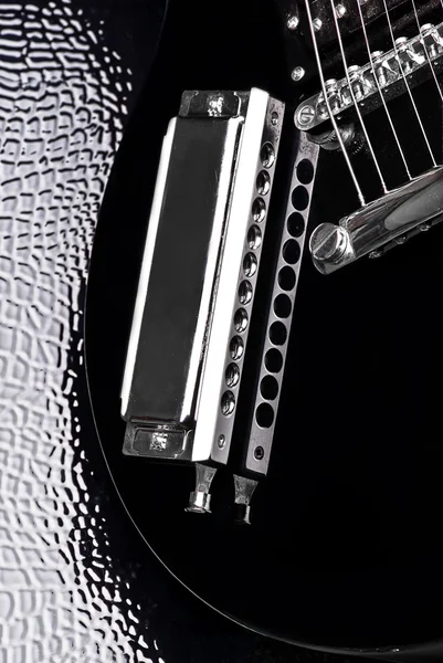 Electric guitar and harmonica — Stock Photo, Image