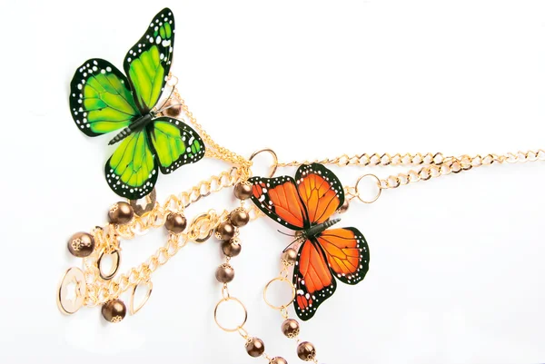 Perles dorées avec papillon — Photo