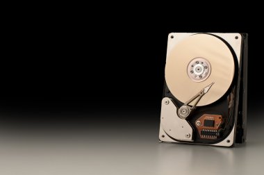 Hard disk - black background clipart