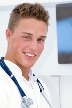 Young doctor smiling 1 clipart