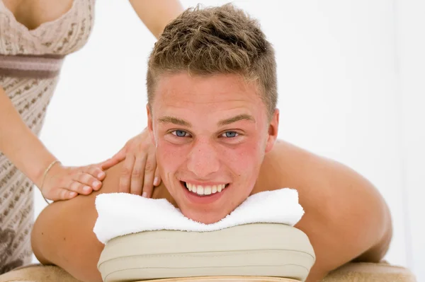 Young man getting a massage — Stock Photo, Image