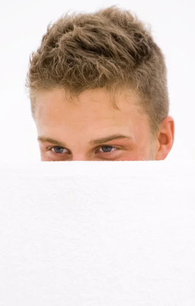 Young man hiding — Stock Photo, Image