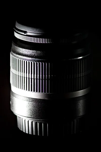 Low key telephoto zoom slr camera lens — Stock Photo, Image