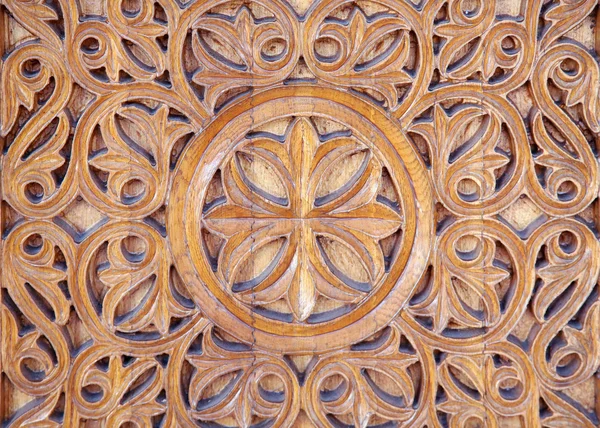 Ornate carved wood — Stockfoto