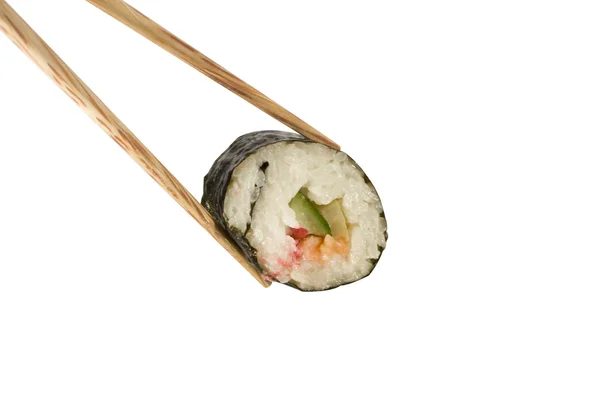 Bacchette con un rotolo di sushi — Foto Stock