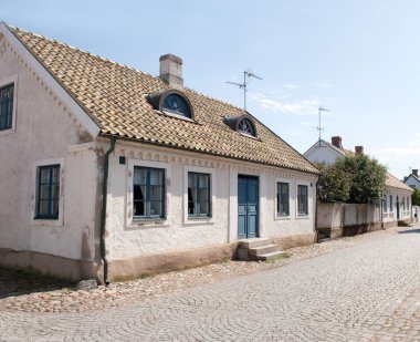 Cobbled street in Torekov, Sweden clipart