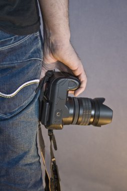 Man holding camera clipart