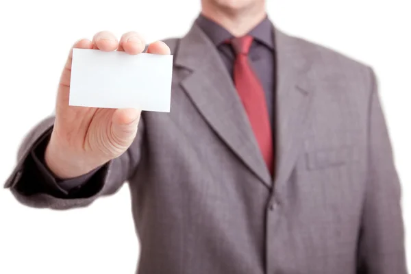 Empresário segurando um cartão em branco — Fotografia de Stock