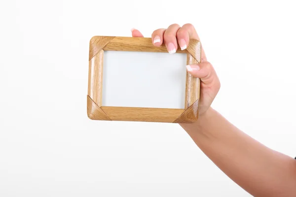 stock image Woman holding frame