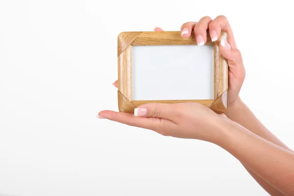 stock image Woman holding frame