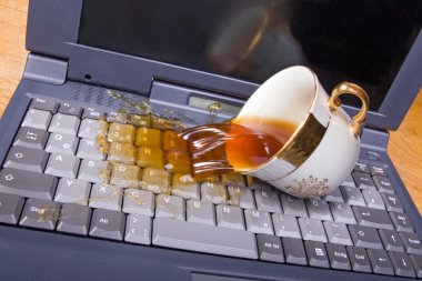 Coffee spilling on keyboard clipart