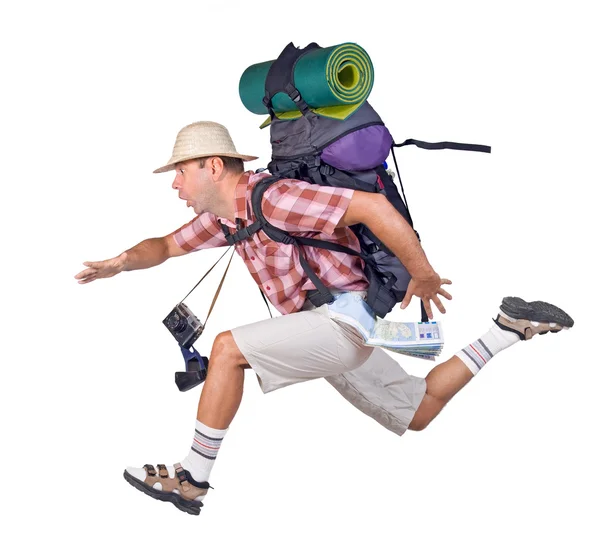 Běžící muž s batohem — Stock fotografie