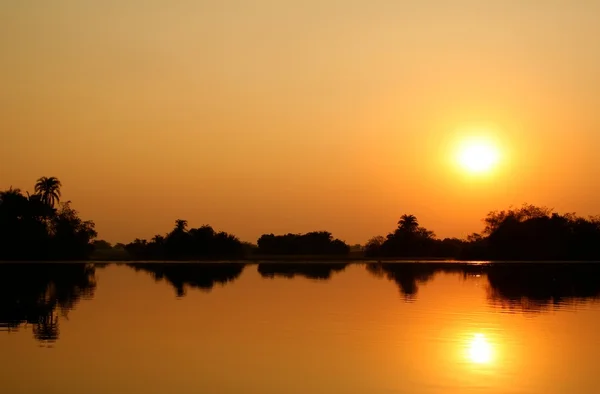 stock image African sunset on water