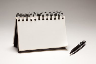 Blank Spiral Note Pad and Pen clipart