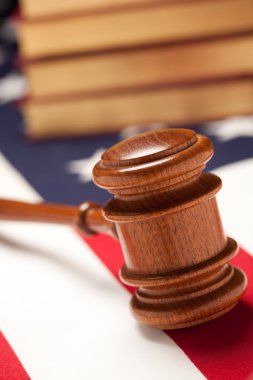 Gavel and Books on the American Flag clipart