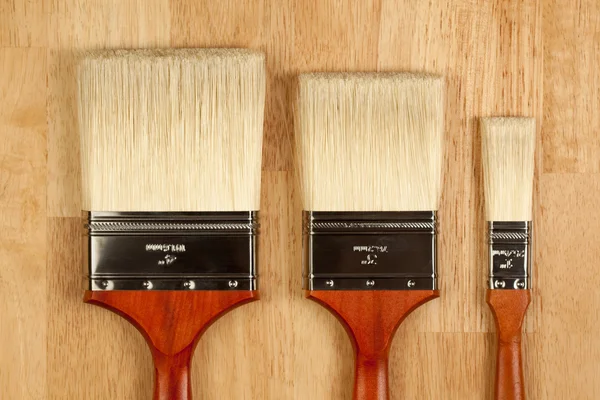 Three Different Sized New Paint Brushes — Stock Photo, Image