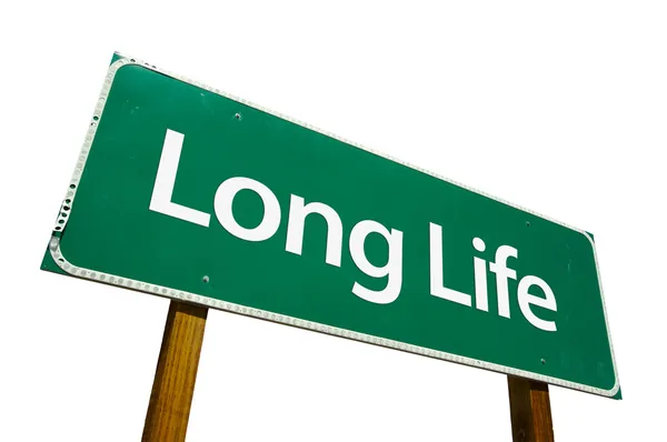 Beyaz uzun yaşam yeşil yol işareti — Stok fotoğraf