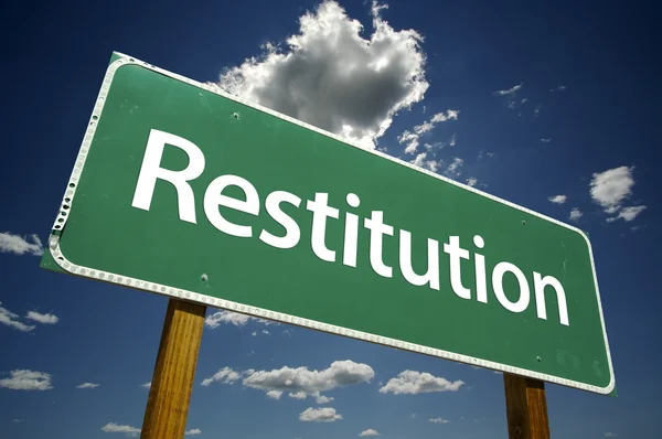 stock image Restitution Green Road Sign