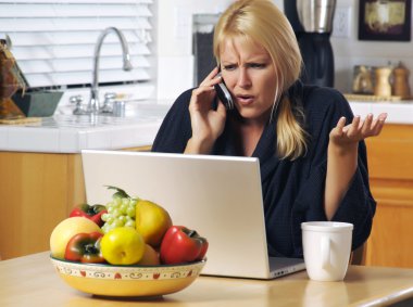 Confused Girl on Cell Phone & Laptop clipart