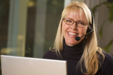 Happy Businesswoman with Phone Headset clipart