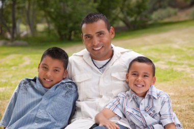 Hispanic Father and Sons Portrait in the clipart