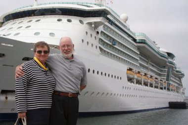 Senior Couple In Front of Cruise Ship clipart