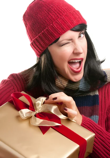 Winking Woman Holds Holiday Gift — Stock Photo, Image