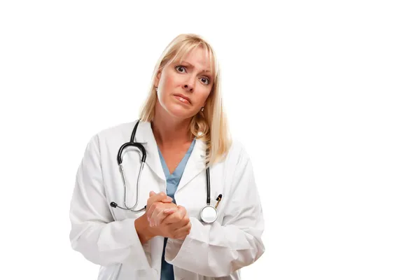 Обеспокоенная блондинка доктор или медсестра — стоковое фото