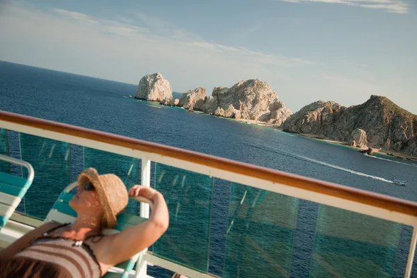 stock image Relaxed Woman Lounges on a Cruise Ship Deck