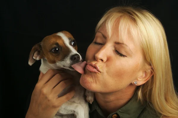 Blond Woman Being Kissed by a JRT — Stock Photo, Image