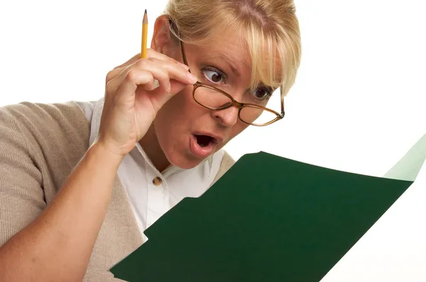 Shocked Woman with Pencil and Folder — Stockfoto