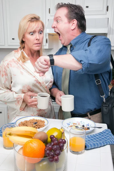 Stressed Couple Checking Time in Kitchen — Stock Photo, Image