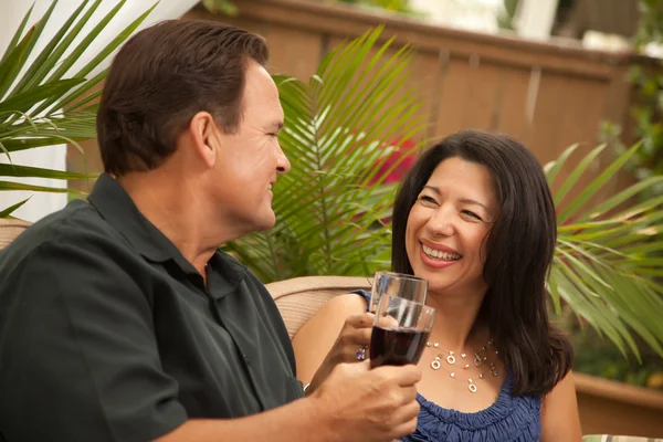 Attractive Hispanic and Caucasian Couple Enjoy Wine — Stock Photo, Image