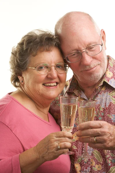 Boldog idősebb pár pirítás — Stock Fotó