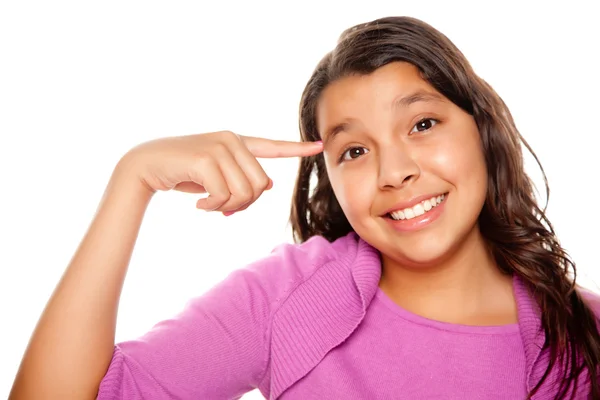 Ganska spansktalande tjej pekar på ansikte — Stockfoto