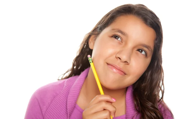 Dziewczynka hiszpanin myślenia z ołówkiem — Zdjęcie stockowe