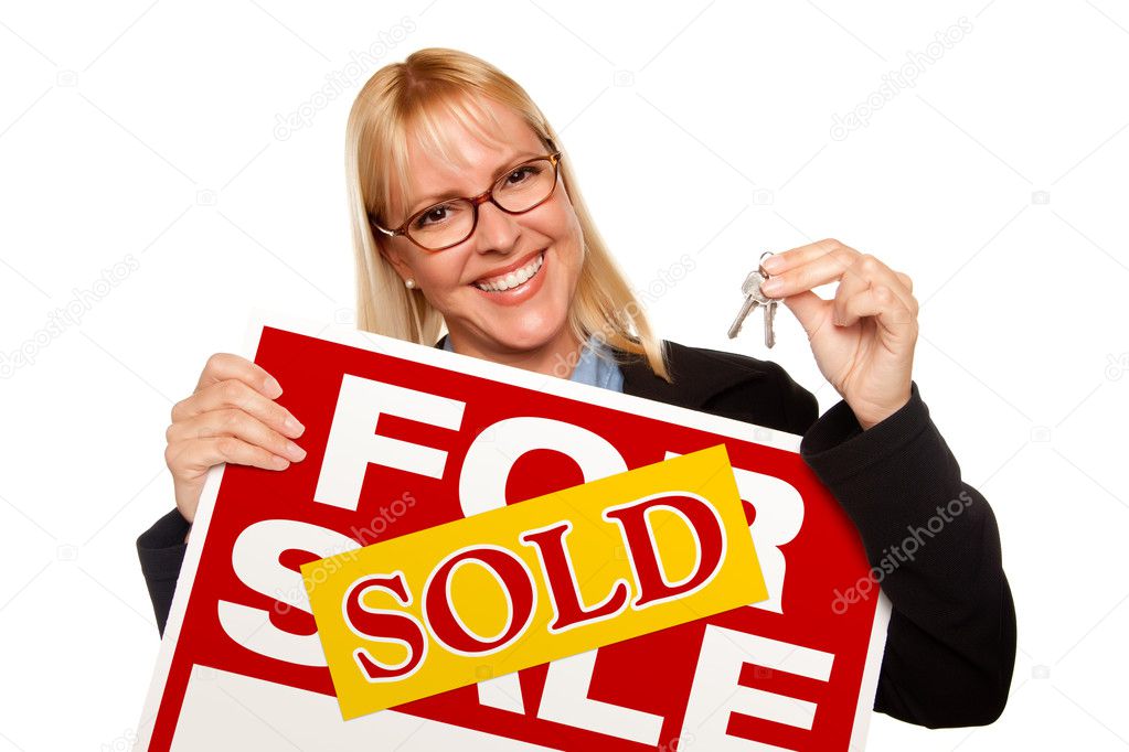 Woman Holding Keys Sold For Sale Sign