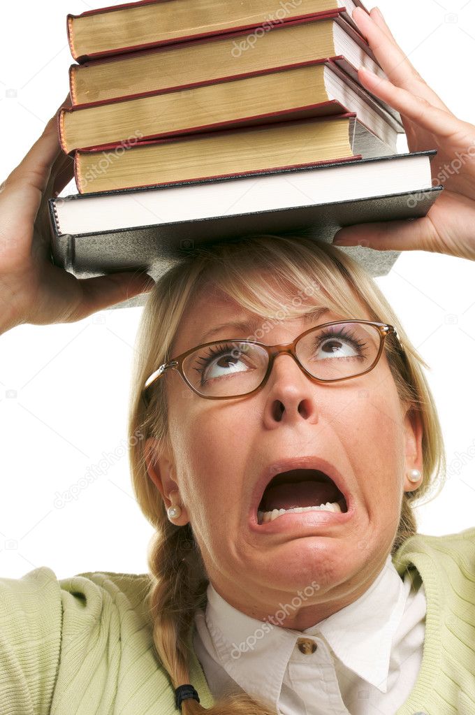 Schoolgirl Balancing Her Books on Head