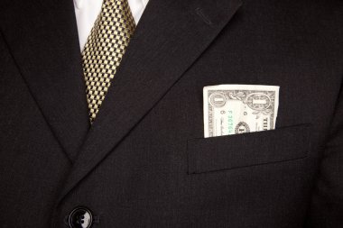 United Stated Dollar Bill in Businessman Coat Pocket clipart