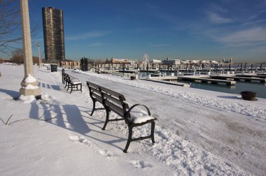 Empty Snowy Bench in Chicago clipart