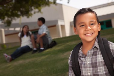 Young Hispanic Boy On His Way to School