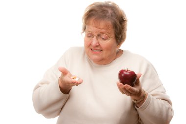 elma ve vitaminler tutan üst düzey kadın karışık