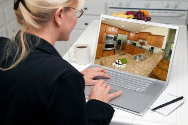 Woman In Kitchen Using Laptop with Kitchen Interior on Screen clipart