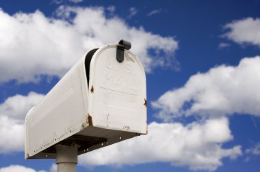 Weathered Old Mailbox on Clouds clipart