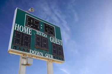 HIgh School Score Board Over Sky clipart