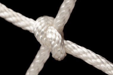 Nylon Rope Knot on a Black Background. clipart